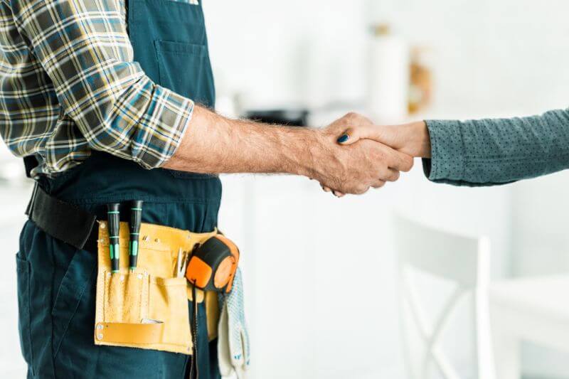 Industrial worker shaking hands